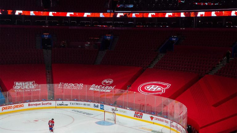 Montreal Canadiens goaltender Jake Allen stands for the national anthem prior to an NHL hockey game against the Calgary Flames in Montreal, Saturday, January 30, 2021 (Graham Hughes/CP).