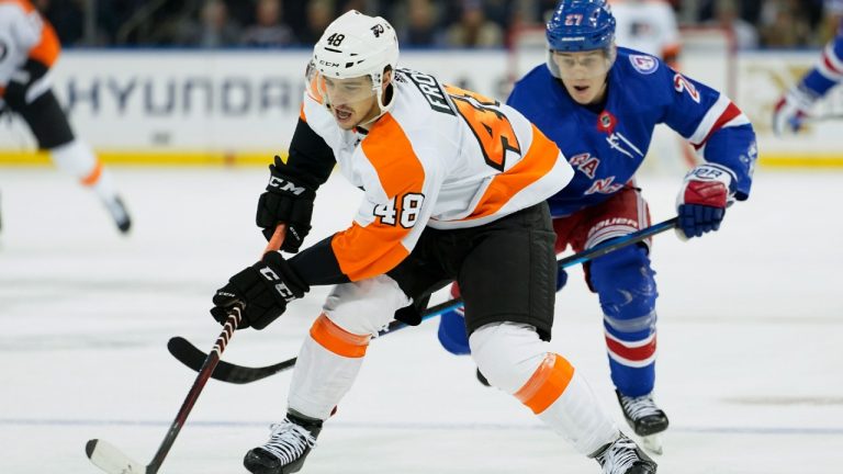 Philadelphia Flyers center Morgan Frost (48) skates against New York Rangers defenseman Nils Lundkvist (27) during the first period of an NHL hockey game, Wednesday, Dec. 1, 2021, at Madison Square Garden in New York. (Mary Altaffer/AP)