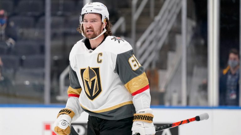 Vegas Golden Knights' Mark Stone celebrates after scoring during the first period of an NHL hockey game against the St. Louis Blues Friday, March 12, 2021, in St. Louis. (Jeff Roberson/AP)