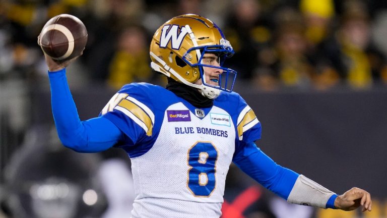 Winnipeg Blue Bombers quarterback Zach Collaros (8) throws the ball against the Hamilton Tiger-Cats during first half football action in the 108th CFL Grey Cup in Hamilton, Ont., on Sunday, December 12, 2021 (Nathan Denette/CP).