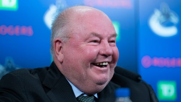 Vancouver Canucks new head coach Bruce Boudreau smiles as he attends a news conference in Vancouver, B.C., Monday, Dec. 6, 2021. (Jonathan Hayward/CP) 