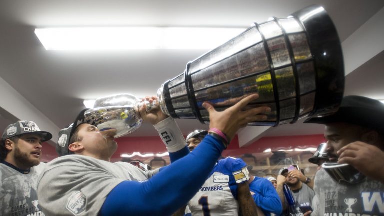 Winnipeg Blue Bombers quarterback Zach Collaros drinks from the Cup as they celebrate winning the 107th Grey Cup against the Hamilton Tiger-Cats. (Nathan Denette/CP)