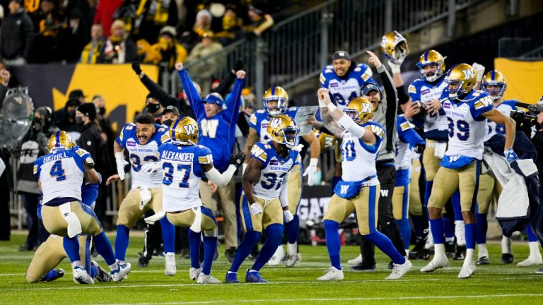 The Winnipeg Blue Bombers celebrate their victory against the Hamilton Tiger-Cats in the 108th CFL Grey Cup in Hamilton, Ont., on Sunday, December 12, 2021. (Ryan Remiorz/CP) 