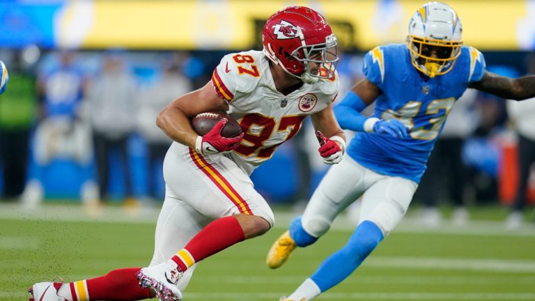 Kansas City Chiefs tight end Travis Kelce runs on his way to scoring a touchdown during overtime in an NFL football game against the Los Angeles Chargers, Thursday, Dec. 16, 2021, in Inglewood, Calif. (Marcio Jose Sanchez/AP)