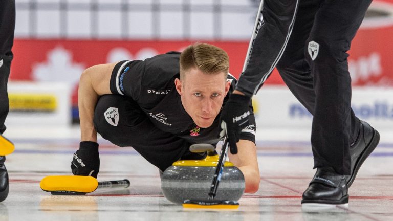 Team Jacobs third Marc Kennedy throws against Team Dunstone during Draw 4 of the 2021 Canadian Olympic curling trials in Saskatoon, Sask., Sunday, Nov. 21, 2021. (Liam Richards/CP)