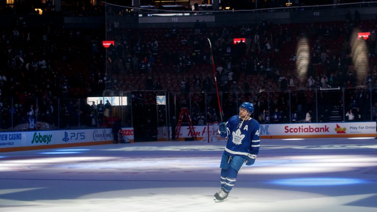 Toronto Maple Leafs defenceman Morgan Rielly (44) takes the ice as the first star of the game following their NHL hockey win over the Columbus Blue Jackets in Toronto on Tuesday, Dec. 7, 2021. (Cole Burston/CP) 