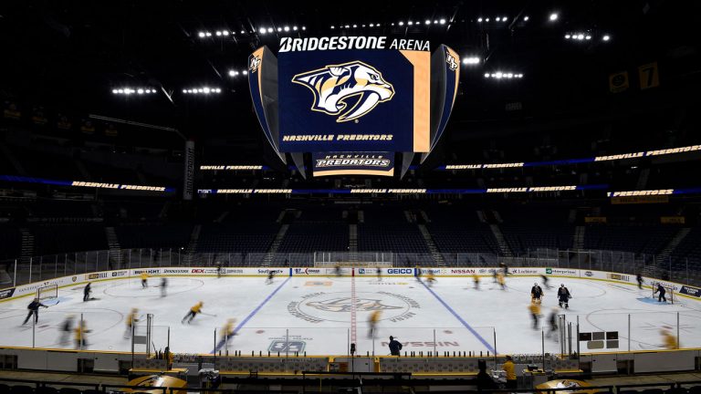 Nashville Predators players skate in the Bridgestone Arena. (George Walker IV/AP) 