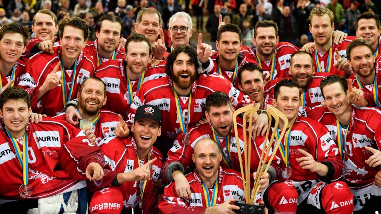 Team Canada celebrates after winning the final game between Team Canada and HC Ocelari Trinec at the 93th Spengler Cup ice hockey tournament in Davos. (Gian Ehrenzeller/AP)