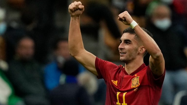 Spain's Ferran Torres celebrates after scoring during the UEFA Nations League semifinal soccer match between Italy and Spain at the San Siro stadium, in Milan, Italy, Wednesday, Oct. 6, 2021. (Antonio Calanni/AP)