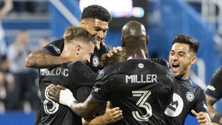 CF Montreal players celebrate a goal by Samuel Piette against Toronto FC during first half MLS soccer action. (Graham Hughes/CP)