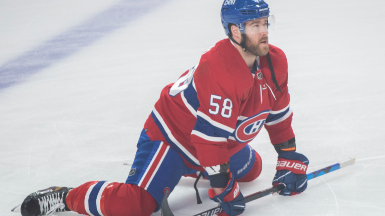 Montreal Canadiens' Davard Savard stretches before a game against the Philadelphia Flyers in Montreal, Thursday, December 16, 2021. (CP/file)