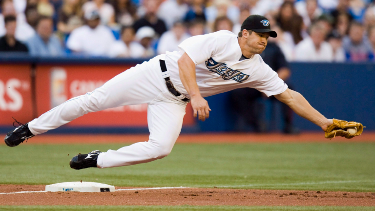 Toronto Blue Jays third baseman Scott Rolen dives for a throwing error during AL action against the Tampa Bay Rays in Toronto on Monday, June 28, 2008. (CP/file)