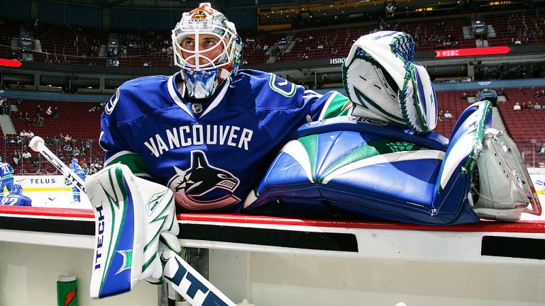 Curtis Sanford spent two seasons with the Vancouver Canucks during his NHL career.   (Jeff Vinnick/Getty)