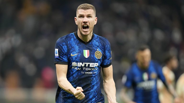 Inter Milan's Edin Dzeko celebrates after scoring his side's second goal during a Serie A soccer match between Inter Milan and Venezia at the San Siro stadium in Milan. (Luca Bruno/AP)