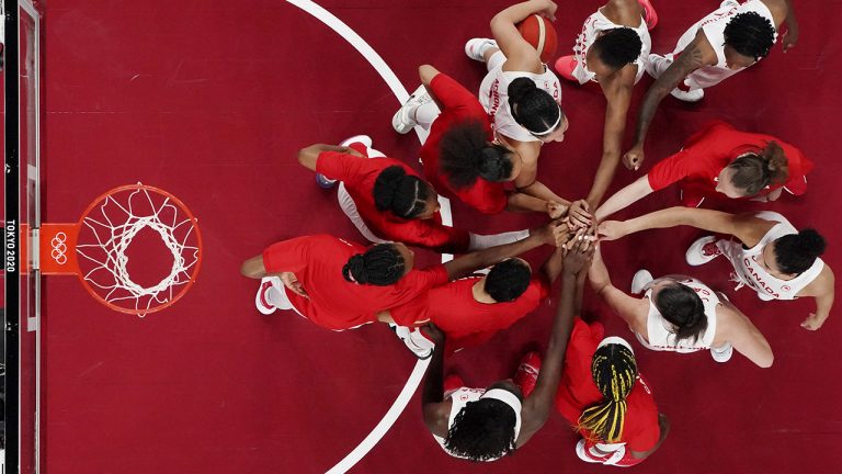 Canada players huddle during a women's basketball game against Spain at the 2020 Summer Olympics. (Brian Snyder/Pool Photo via AP)