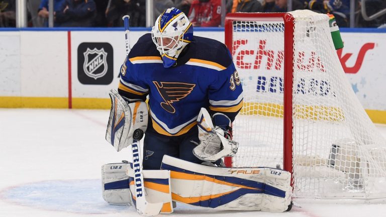 St. Louis Blues goaltender Ville Husso (35) blocks a shot from the Washington Capitals during the first period of an NHL hockey game Friday, Jan. 7, 2022, in St. Louis. (Joe Puetz/AP) 