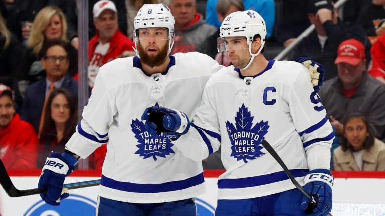 Toronto Maple Leafs center John Tavares (91) celebrates his goal with Jake Muzzin (8) in the first period of an NHL hockey game against the Detroit Red Wings, Wednesday, Nov. 27, 2019, in Detroit. (Paul Sancya/AP)