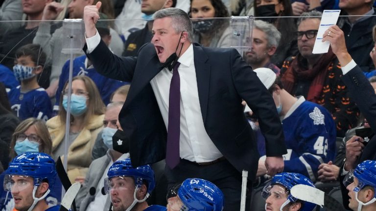 Toronto Maple Leafs head coach Sheldon Keefe yells at the referee while playing against the Detroit Red Wings during third period NHL hockey action in Toronto on Saturday, October 30, 2021. (Nathan Denette/CP)