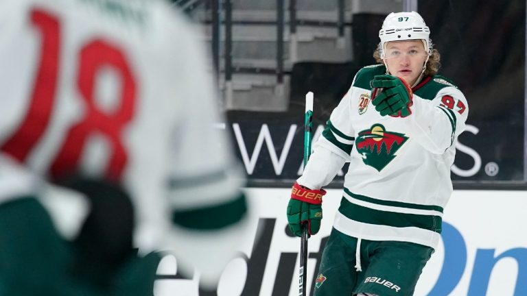 Minnesota Wild left wing Kirill Kaprizov (97) celebrates after scoring against the Vegas Golden Knights during the first period of an NHL hockey game Thursday, April 1, 2021, in Las Vegas. (John Locher/AP) 