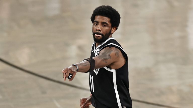 FILE - In this June 5, 2021, file photo, Brooklyn Nets guard Kyrie Irving (11) reacts against the Milwaukee Bucks during the second half of Game 1 of an NBA basketball second-round playoff series in New York. (Adam Hunger, File/AP)