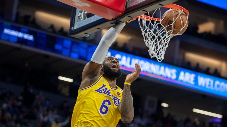 Los Angeles Lakers forward LeBron James (6) dunks for a basket in the first quarter of an NBA basketball game against the Sacramento Kings in Sacramento, Calif., Wednesday, Jan. 12, 2022. (Jose Luis Villegas/AP)