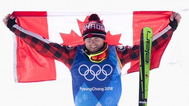 Brady Leman, of Canada, celebrates his gold medal win in the men's ski cross final at the 2018 Winter Olympic Games in Pyeongchang. (Jonathan Hayward/CP)