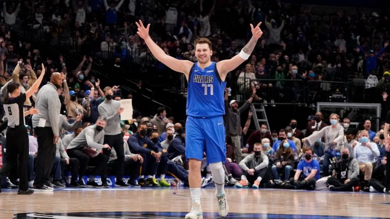 Dallas Mavericks guard Luka Doncic (77) reacts to a three-point basket during the second half of an NBA basketball game against the Dallas Mavericks in Dallas, Monday, Jan. 3, 2022. (LM Otero/AP) 