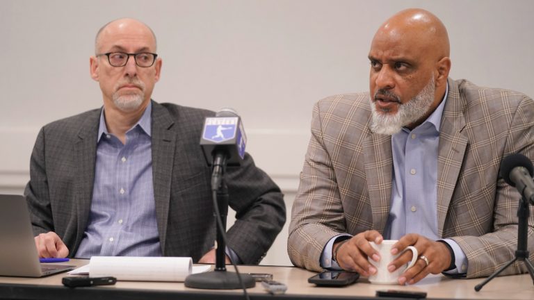 Major League Baseball union head Tony Clark, right, speaks as chief negotiator for the players association Bruce Meyer looks on during a media availability in Irving, Texas, Thursday, Dec. 2, 2021. Owners locked out players at 12:01 a.m. Thursday following the expiration of the sport's five-year collective bargaining agreement.(LM Otero/AP) 