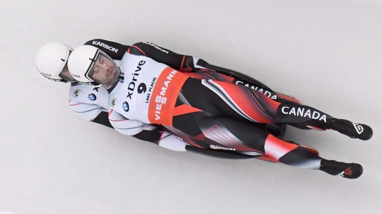 Tristan Walker and Justin Snith, of Canada, compete in the luge sprint World Cup event on Sunday, Dec. 16, 2018, in Lake Placid, N.Y. (Hans Pennink/AP)