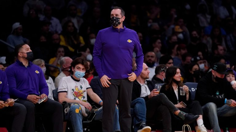 Los Angeles Lakers head coach Frank Vogel stands on the sideline during the second half of an NBA basketball game against the Indiana Pacers in Los Angeles, Wednesday, Jan. 19, 2022. (Ashley Landis/AP Photo) 
