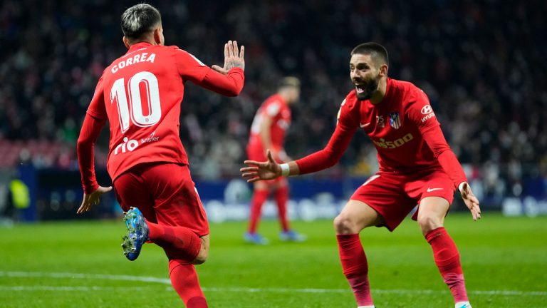 Atletico Madrid's Angel Correa, left, celebrates after scoring his side's second goal during a Spanish La Liga soccer match between Atletico Madrid and Valencia at the Wanda Metropolitano stadium. (Manu Fernandez/AP) 