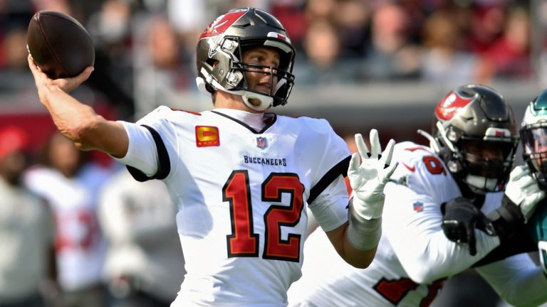 Tampa Bay Buccaneers quarterback Tom Brady (12) fires a pass against the Philadelphia Eagles during the first half of an NFL wild-card football game Sunday, Jan. 16, 2022, in Tampa, Fla. (Jason Behnken/AP)