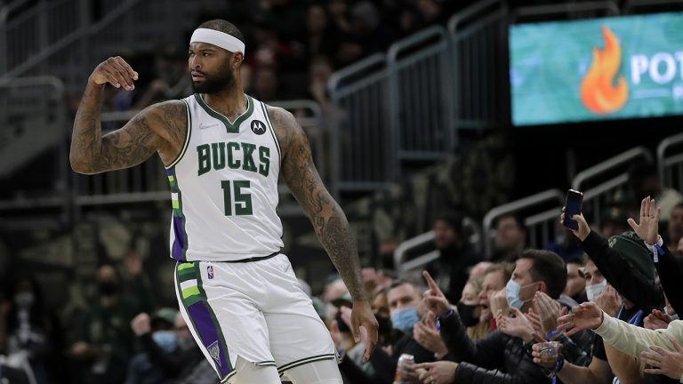 Milwaukee Bucks' DeMarcus Cousins gestures after making a shot during the first half of the team's NBA basketball game against the Toronto Raptors. (Aaron Gash/AP)