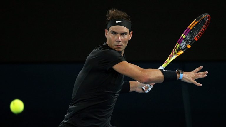 Rafael Nadal of Spain plays a forehand during his singles match against Ricardas Berankis of Lithuania at Summer Set tennis tournament ahead of the Australian Open in Melbourne, Australia, Thursday, Jan. 6, 2022. (Hamish Blair/AP)