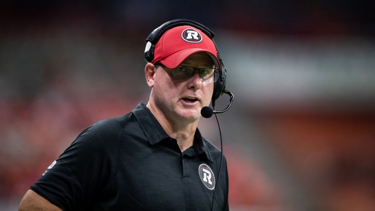 Ottawa Redblacks head coach Paul LaPolice stands on the sideline during the second half of a CFL football game against the B.C. Lions. (Darryl Dyck/CP)