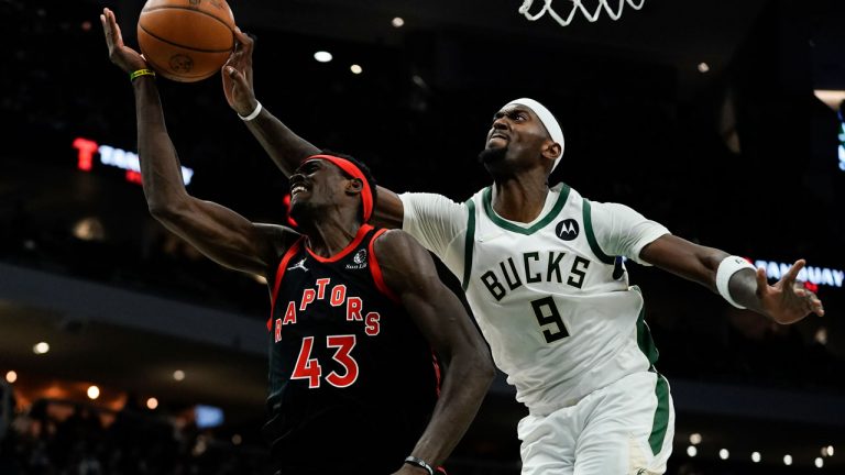 Milwaukee Bucks' Bobby Portis blocks the shot of Toronto Raptors' Pascal Siakam during the first half of an NBA basketball game. (Morry Gash/AP) 