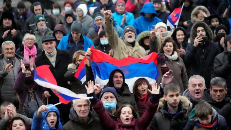 Supporters of Serbia's Novak Djokovic protest in Belgrade, Serbia, Saturday, Jan. 8, 2022. The No. 1-ranked Djokovic was denied entry at the Melbourne airport late Wednesday after border officials cancelled his visa for failing to meet its entry requirement that all non-citizens be fully vaccinated for COVID-19. (Darko Vojinovic/AP)