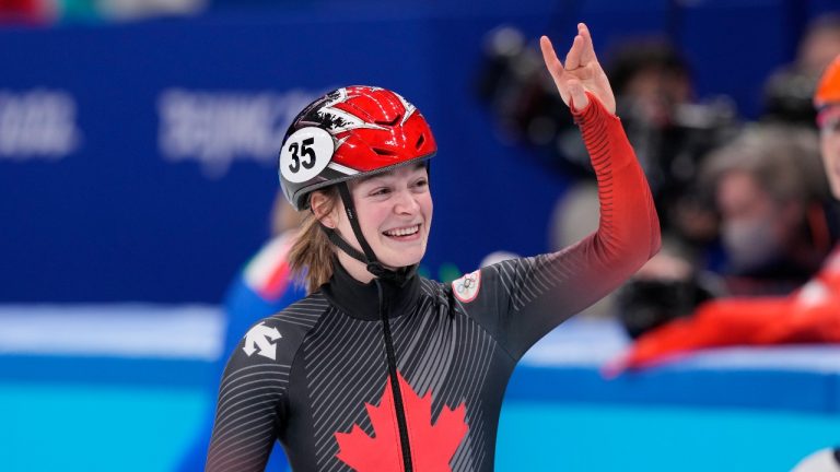 Canada's Kim Boutin reacts after winning the bronze medal in women's 500-metre short-track speedskating at the Beijing Winter Olympics in Beijing, China, on Monday, Feb. 7, 2022. (Paul Chiasson/THE CANADIAN PRESS)