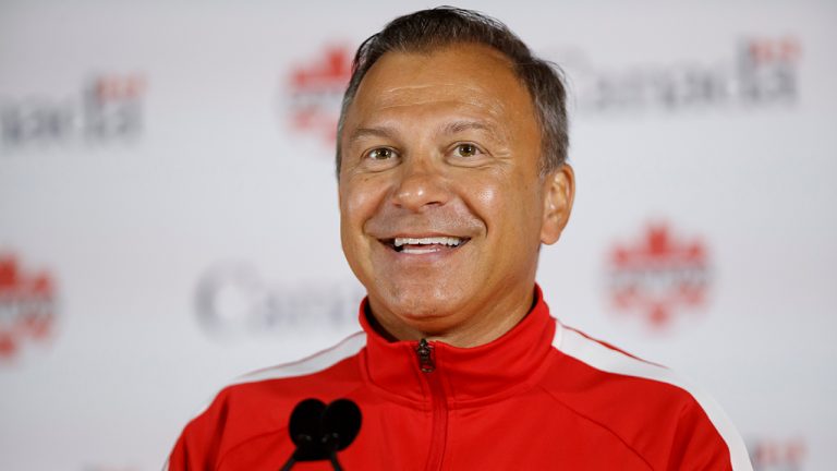 Soccer Canada's president Nick Bontis smiles during a press conference at BMO Field in Toronto on Aug. 10, 2021. (Cole Burston/CP)