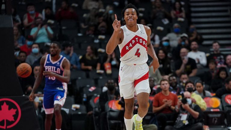 Toronto Raptors rookie Scottie Barnes (4) reacts after a slam dunk against the Philadelphia 76ers. (Nathan Denette/CP)