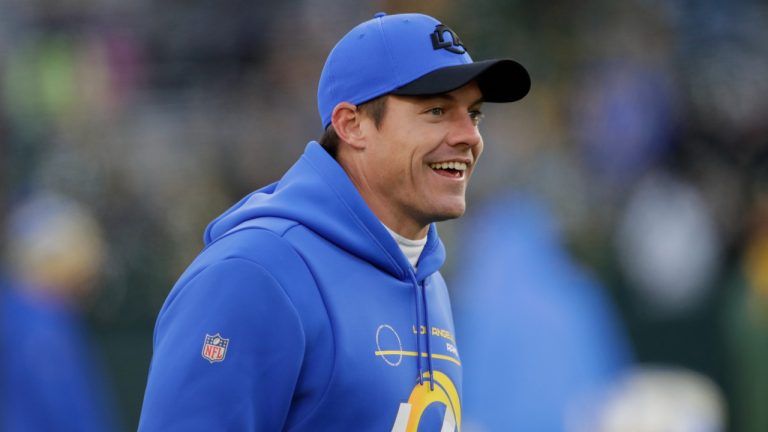 Los Angeles Rams offensive coordinator Kevin O'Connell sdmiles before an NFL football game against the Green Bay Packers Sunday, Nov. 28, 2021, in Green Bay, Wis. (AP Photo/Aaron Gash)