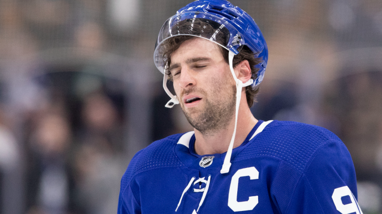 Toronto Maple Leafs captain John Tavares reacts after his team's 5-3 loss to the Tampa Bay Lightning in NHL action in Toronto on Dec. 9, 2021. (CP/file)