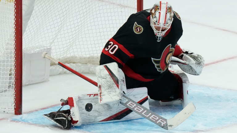 Ottawa Senators goaltender Matt Murray makes a save
during second period NHL action against the New Jersey Devils, in Ottawa, Monday, Feb. 7, 2022. (CP)