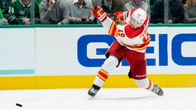 Calgary Flames left wing Matthew Tkachuk takes a shot at the net in the second period of an NHL hockey game against the Dallas Stars in Dallas, Tuesday, Feb. 1, 2022. (Tony Gutierrez/AP)