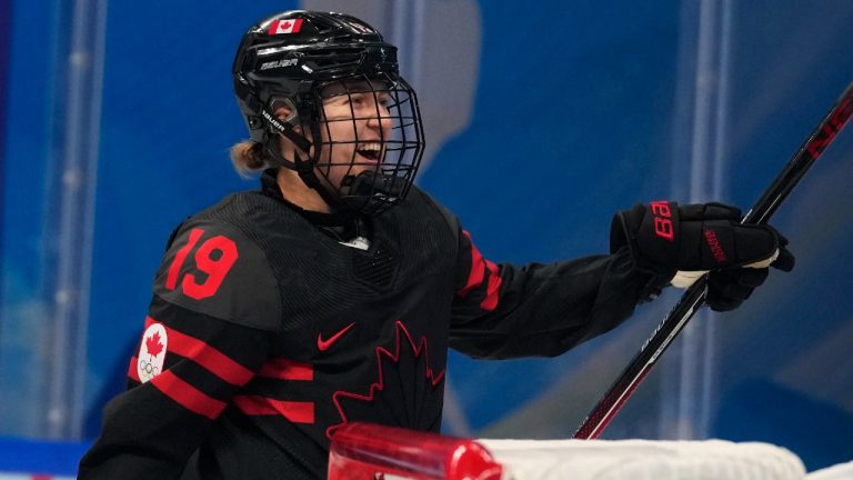 Canada's Brianne Jenner (19) celebrates scoring against Sweden during a women's quarterfinal hockey game at the 2022 Winter Olympics, Friday, Feb. 11, 2022, in Beijing. (Petr David Josek/AP)