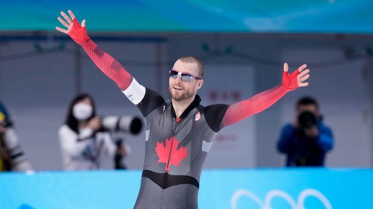 Laurent Dubreuil of Canada reacts after winning the silver medal in the men's 1,000 metre speedskating race at the 2022 Winter Olympics in Beijing on Friday, February 18, 2022. (Paul Chiasson/THE CANADIAN PRESS)