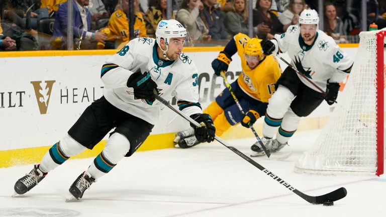 San Jose Sharks defenceman Mario Ferraro (38) brings the puck around the net in the second period of an NHL hockey game against the Nashville Predators Tuesday, Oct. 26, 2021, in Nashville, Tenn. (Mark Humphrey/AP)