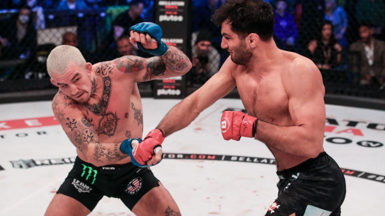 Gegard Mousasi, right, punches Austin Vanderford moments before defending his middleweight title in the main event of Bellator 275. (Lucas Noonan/Bellator MMA)