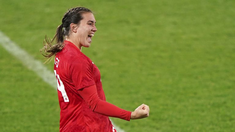 Canada's Vanessa Gilles celebrates scoring her side's first goal of the game during the Arnold Clark Cup women's soccer match between Canada and Germany. (Joe Giddens/PA via AP)