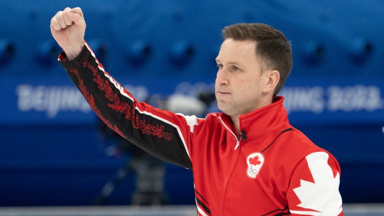 Canada’s Brad Gushue reacts after winning the bronze medal curling match by beating the United States 8-5 Friday, February 18, 2022 at the 2022 Winter Olympics in Beijing. (Ryan Remiorz/THE CANADIAN PRESS)